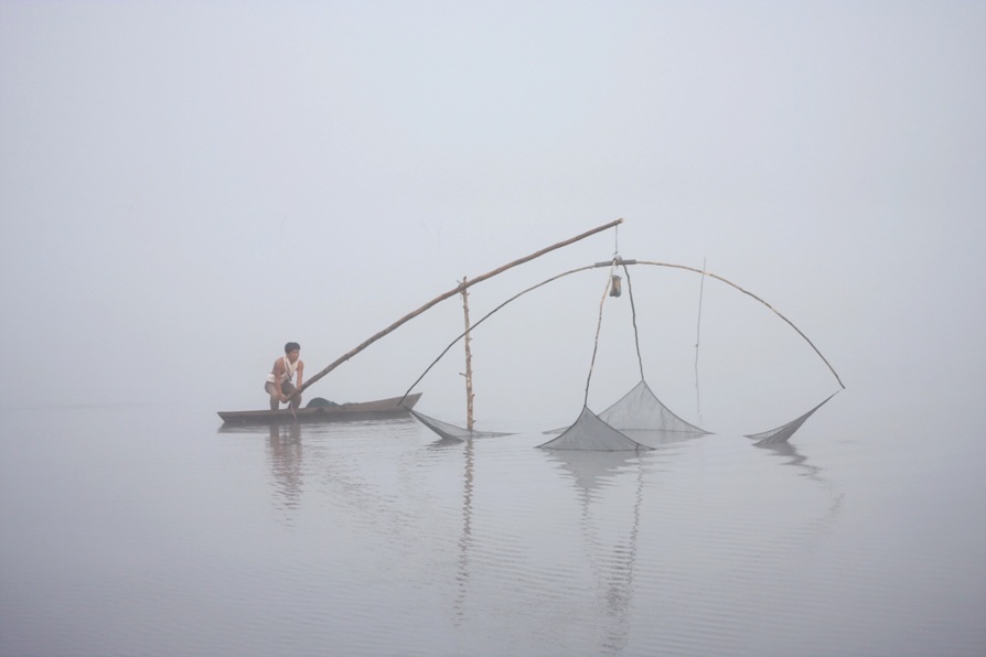 A fisherman pulls his net out of the water, Nanang Indra Kurniawan 14 fisherman net