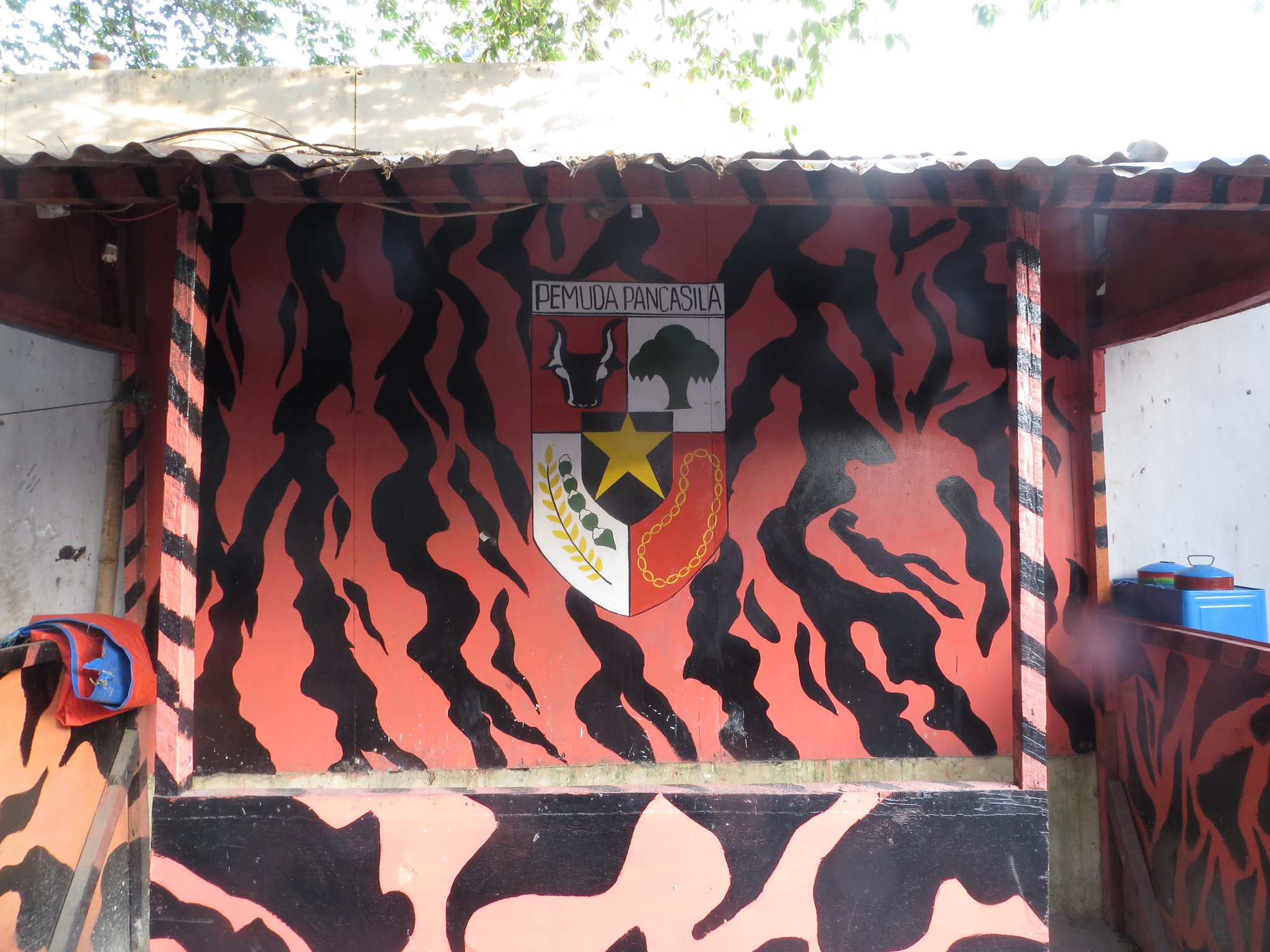 A coat-of-arms signifying Pemuda Pancasila painted at an ojek stop. (Don Meliton/Flickr) A coat-of-arms signifying Pemuda Pancasila painted at an ojek stop. (Don Meliton/Flickr)