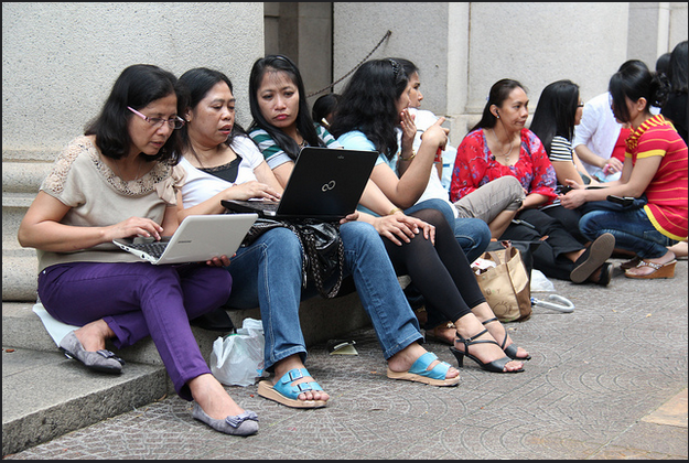 A luxury too far? Migrant workers in Hong Kong rely on laptops to contact their families - KC Wong  A luxury too far? Migrant workers in Hong Kong rely on laptops to contact their families - KC Wong (https://www.flickr.com/photos/77290926@N07/7128911245)
