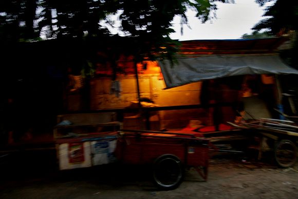 Some people build semi-permanent tents along the wall to sleep in. They have to pay illegal rent for this space  to a local bureaucrat ciliwung17.jpg