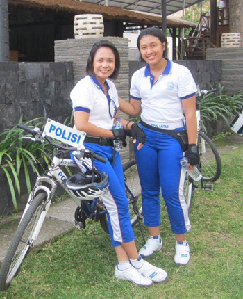 Policewomen in Lombok patrol on bicycles, Sharyn Graham Davies grahamdavies3