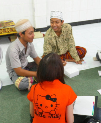 Chinese Christian students discussing religion at an Islamic boarding    school / Lyn Parker  Teaching religious tolerance