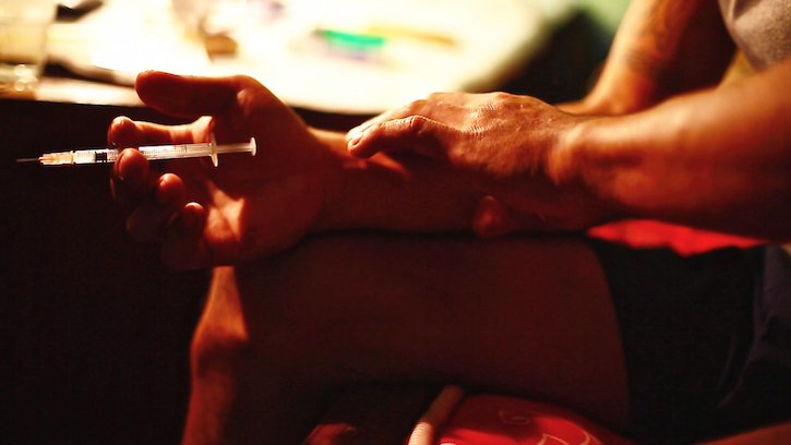 Preparing the injection - Sari Damar Ratri Preparing the injection - Sari Damar Ratri